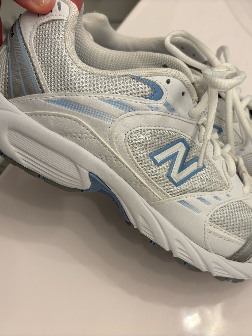New Balance White and Light Blue Athletic Sneakers
